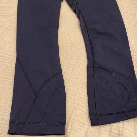 Lululemon navy leggings with back pocket. Size 2 - Picture 10 of 13